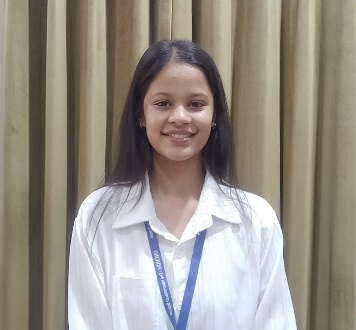 A child smiling at cameraAI-generated content may be incorrect.